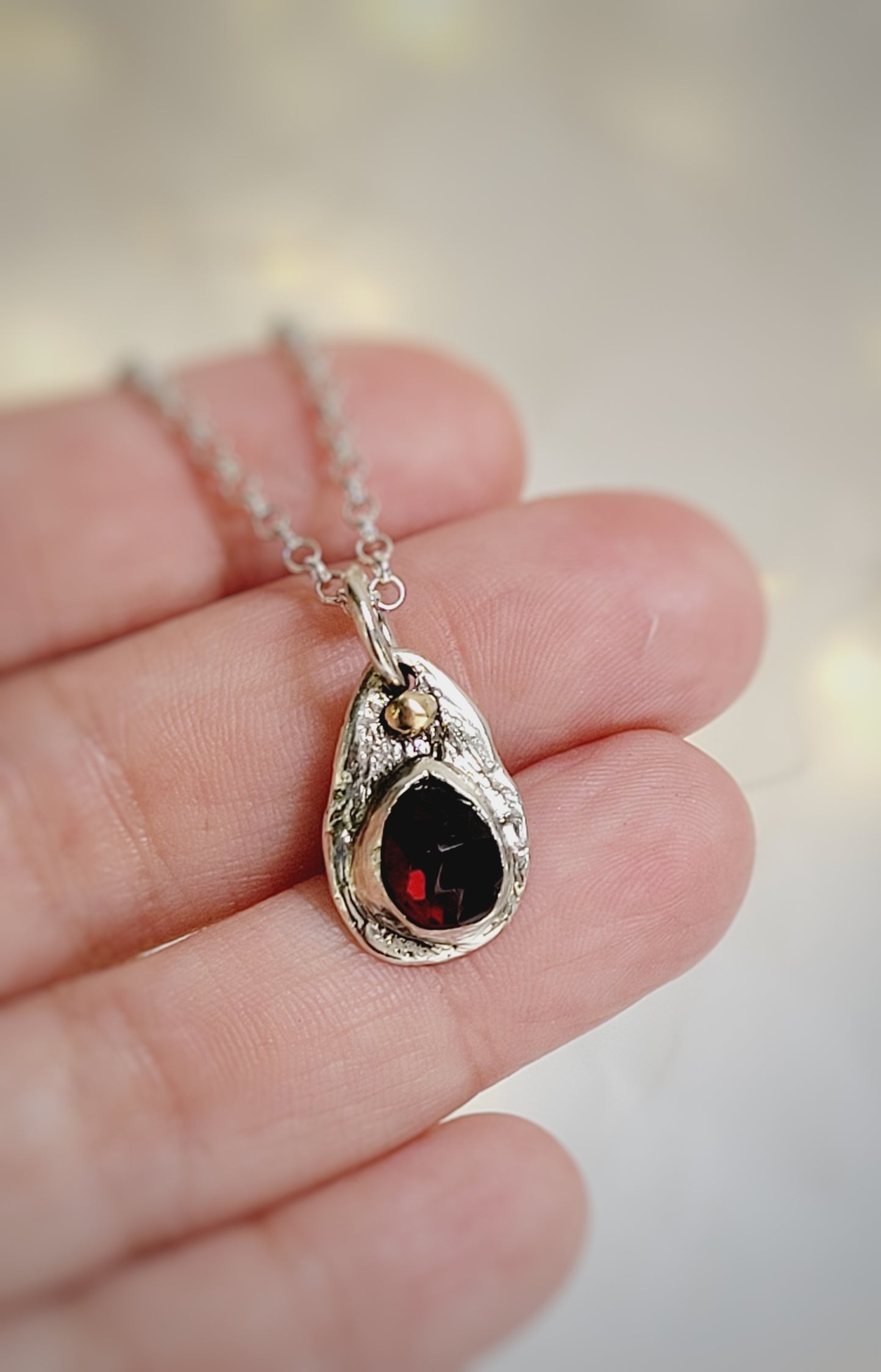 Sterling Silver pendant with Garnet and 14K Gold