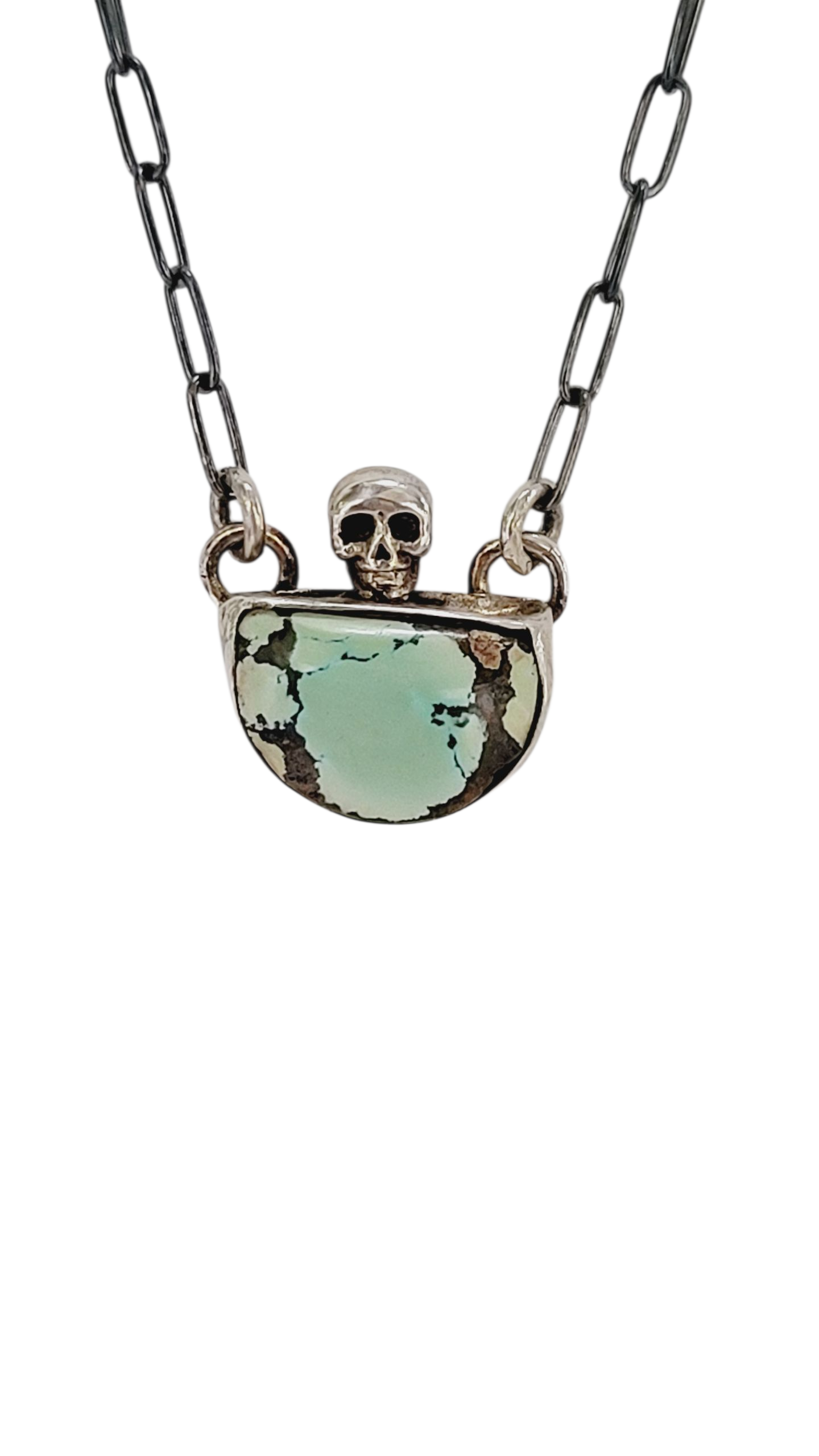 Handcrafted Sterling Silver pendant features a high-quality Turquoise stone