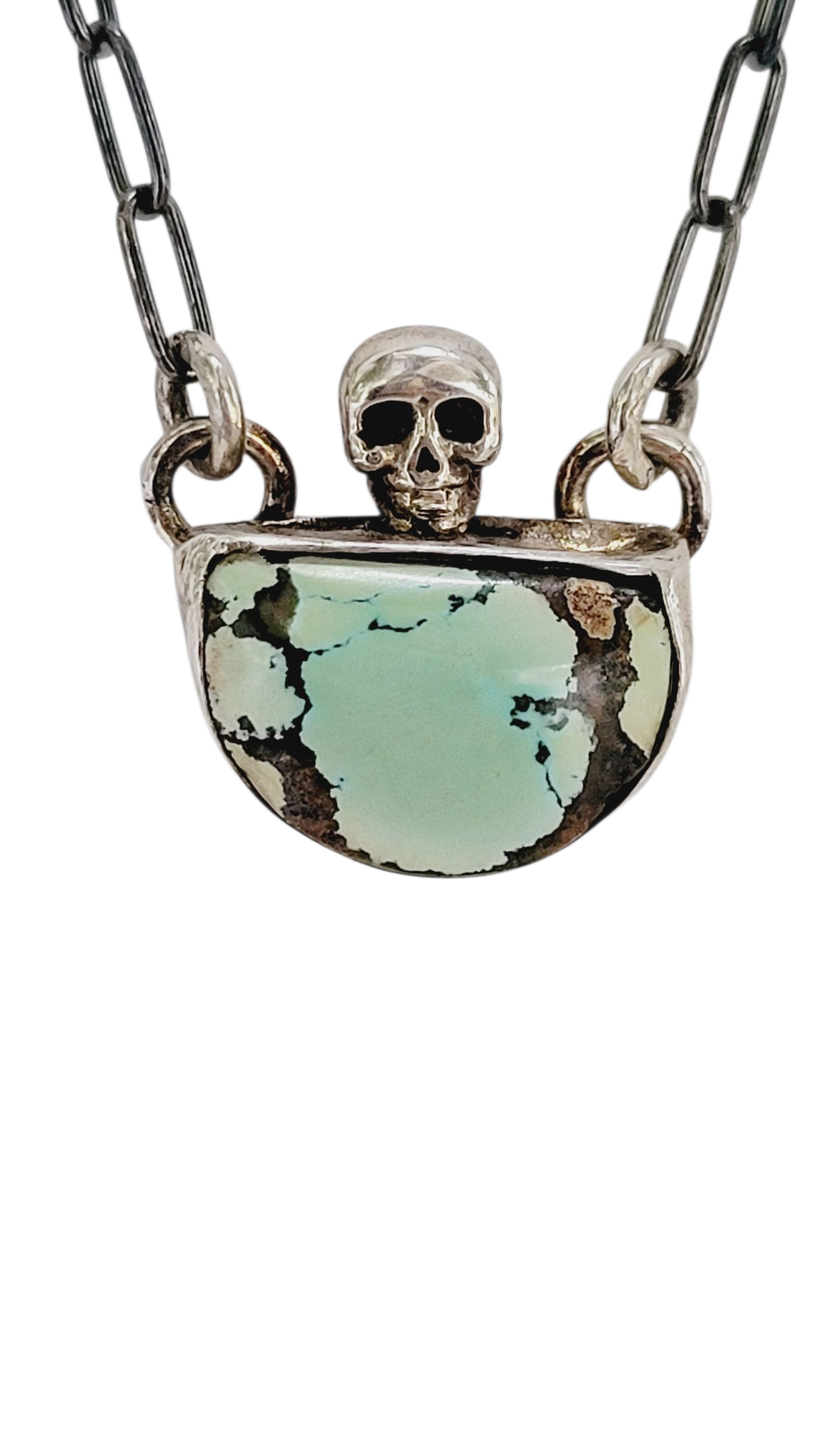 Handcrafted Sterling Silver pendant features a high-quality Turquoise stone