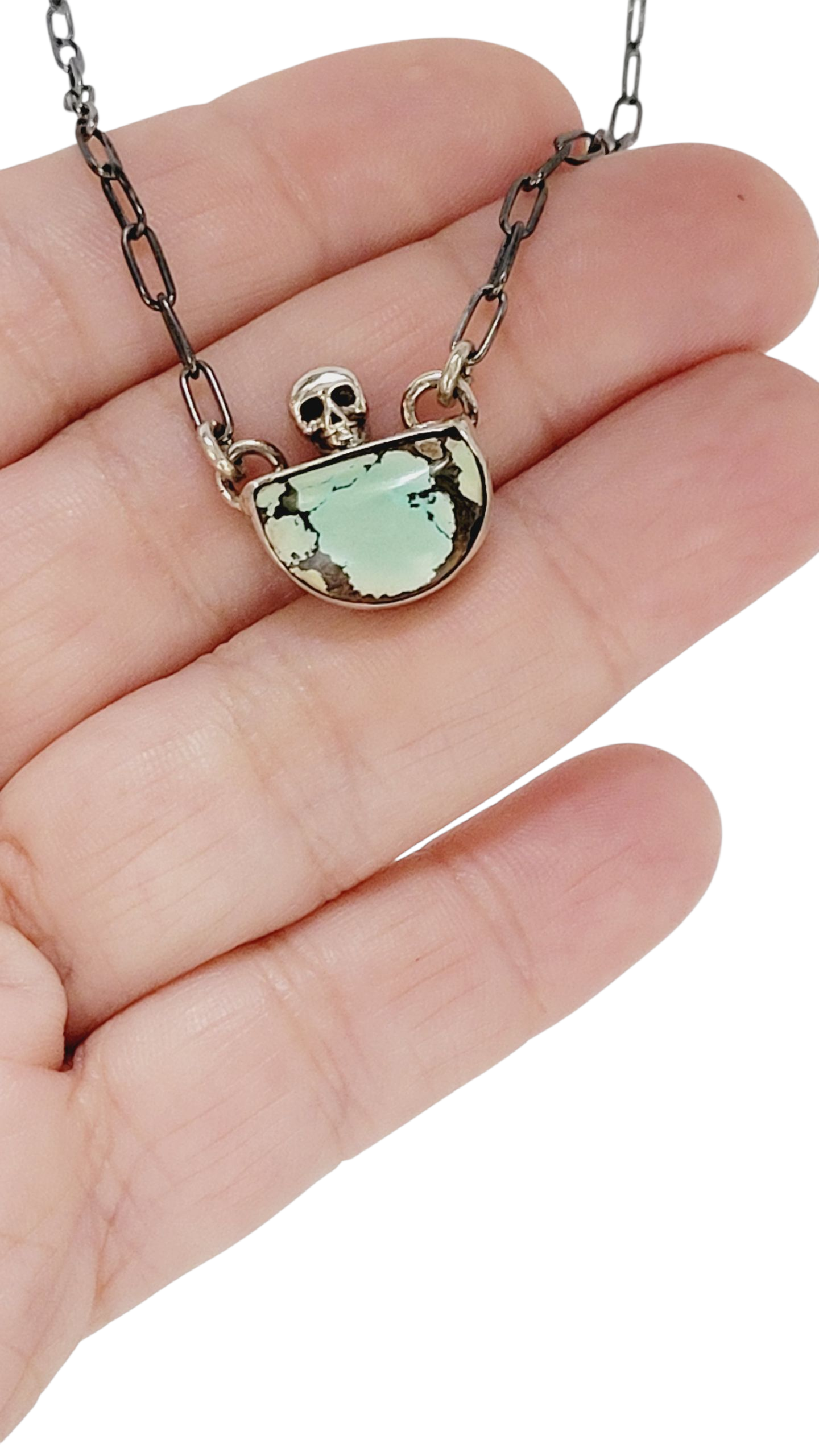 Handcrafted Sterling Silver pendant features a high-quality Turquoise stone