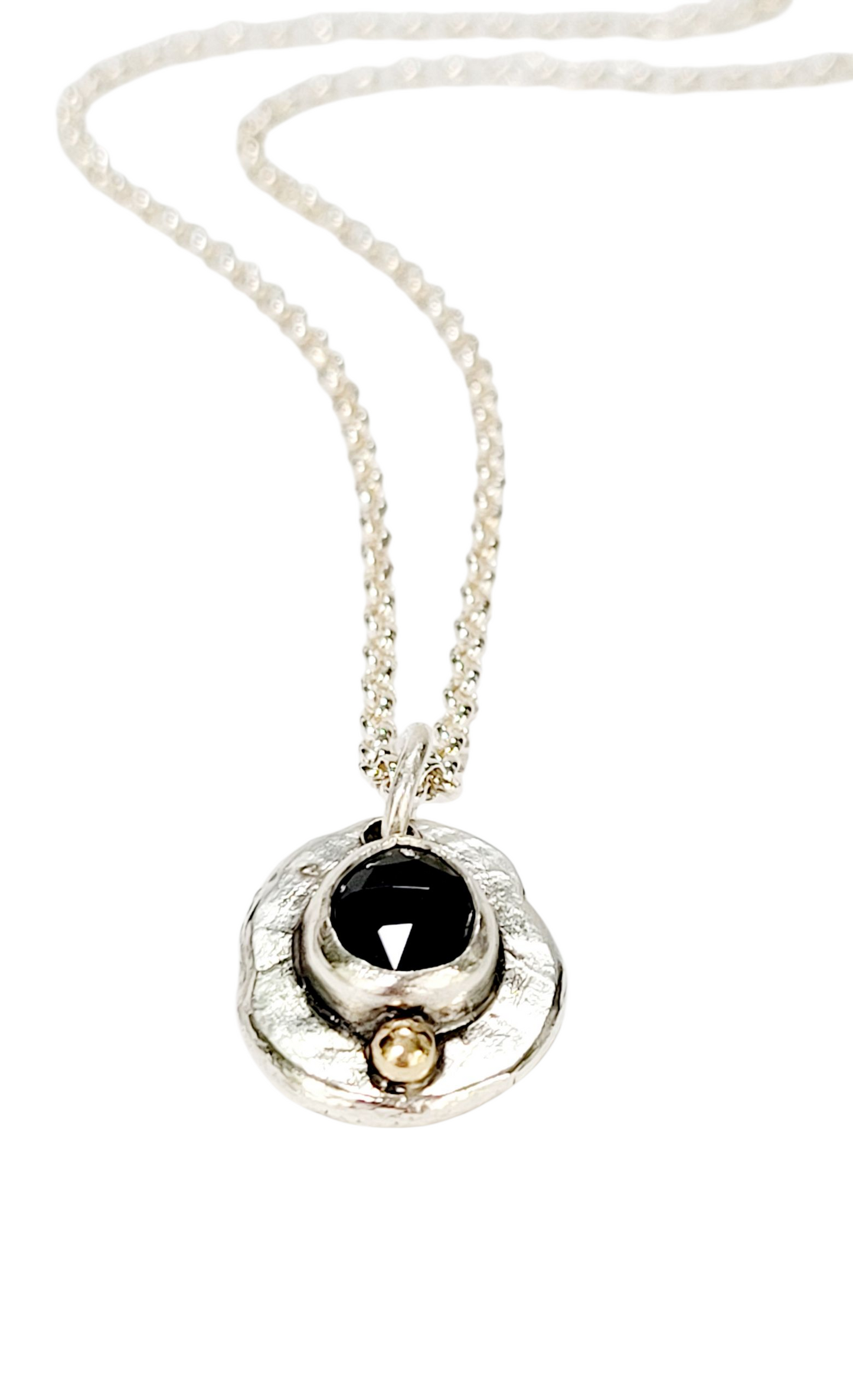 Handmade pendant in sterling silver with 14k gold detail and faceted onyx set