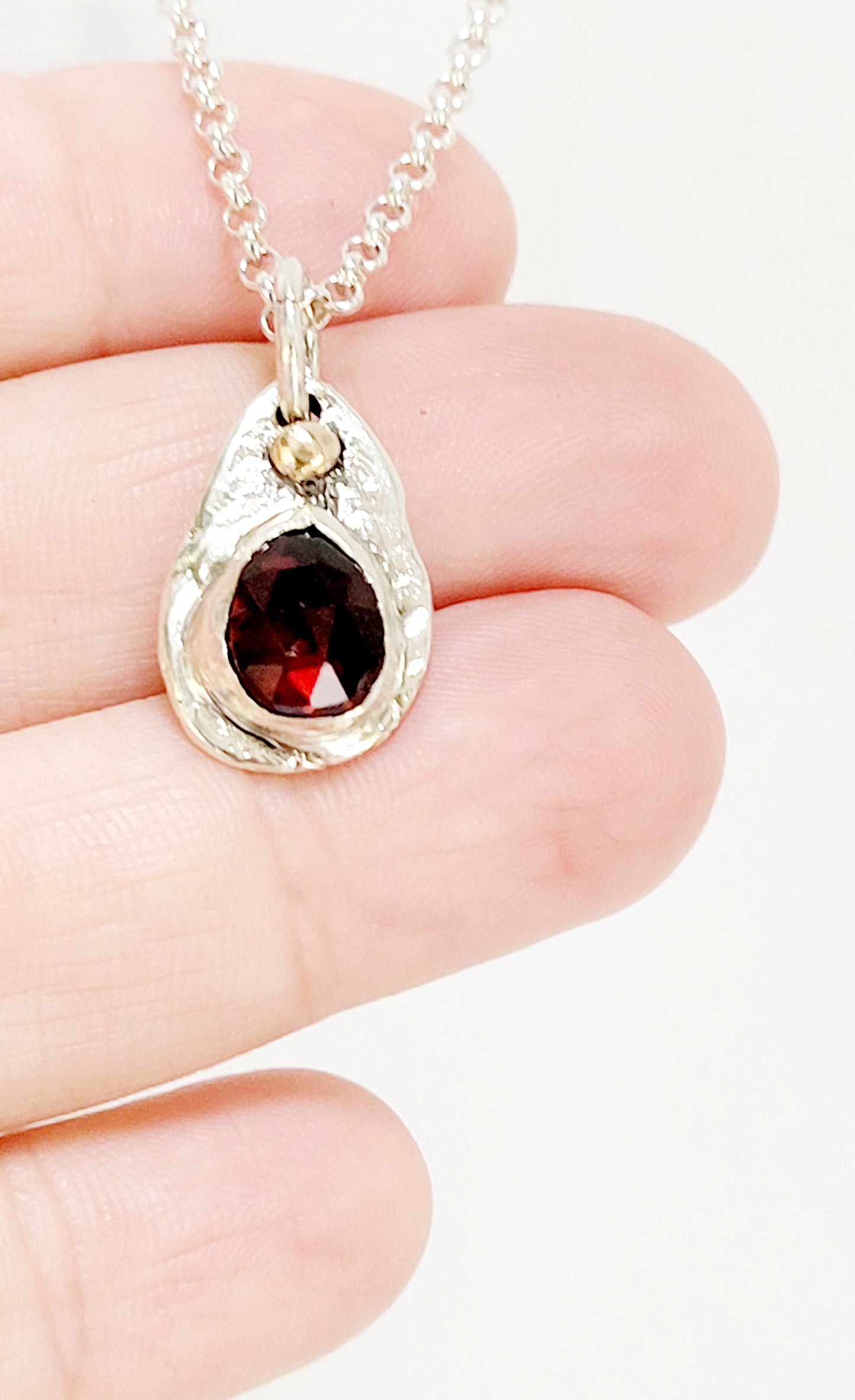 Sterling Silver pendant with Garnet and 14K Gold
