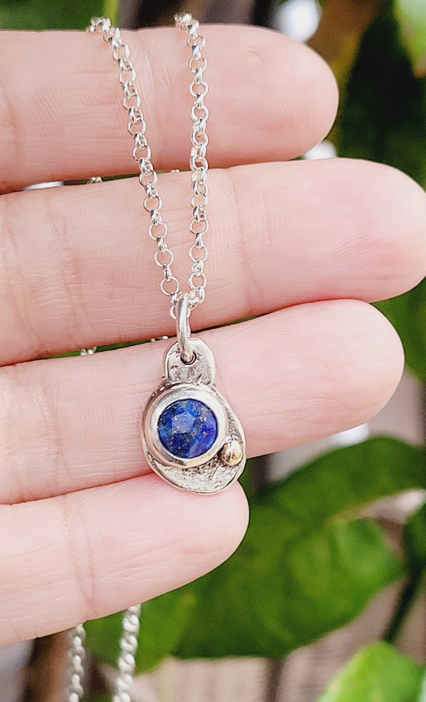 Sterling silver pendant with faceted Lapislazuli and 14k gold