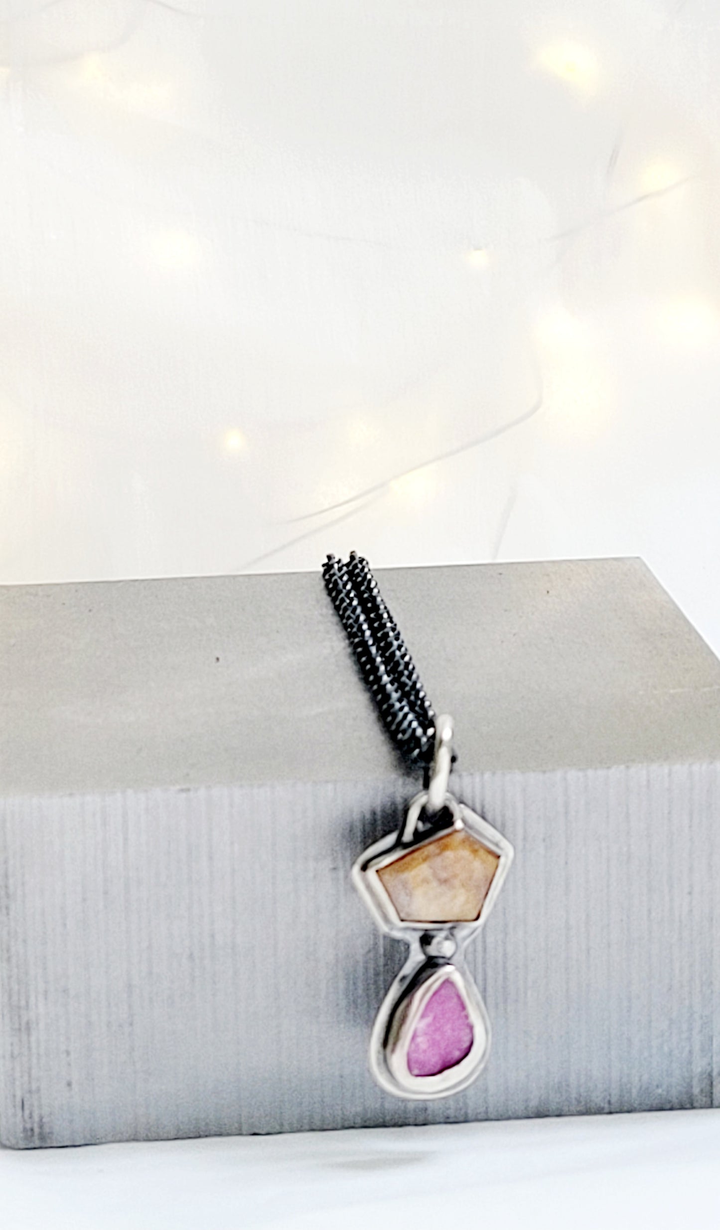 Handmade sterling silver pendant set with a citrine topaz and a cobalt mineral