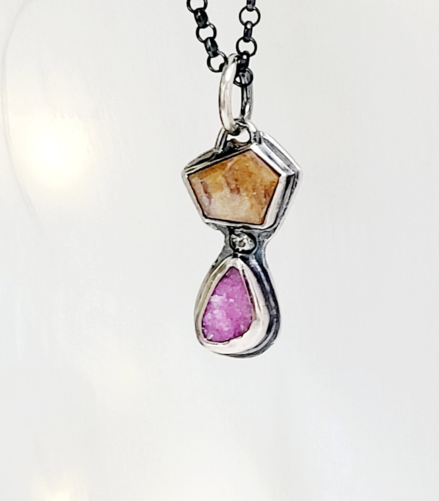 Handmade sterling silver pendant set with a citrine topaz and a cobalt mineral