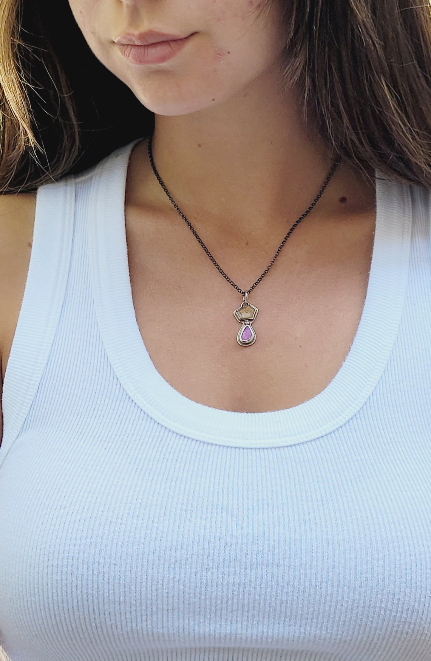 Handmade sterling silver pendant set with a citrine topaz and a cobalt mineral