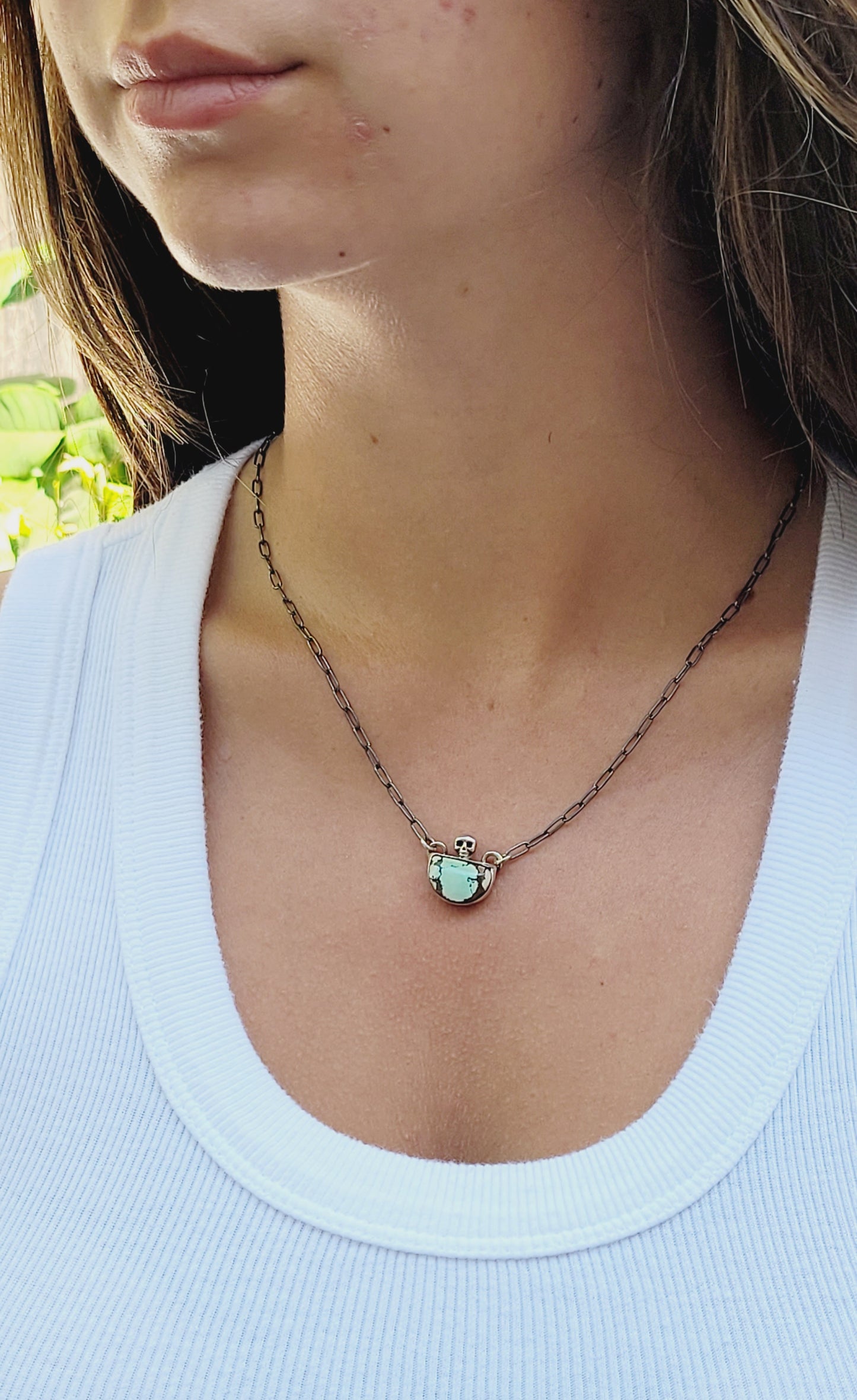Handcrafted Sterling Silver pendant features a high-quality Turquoise stone