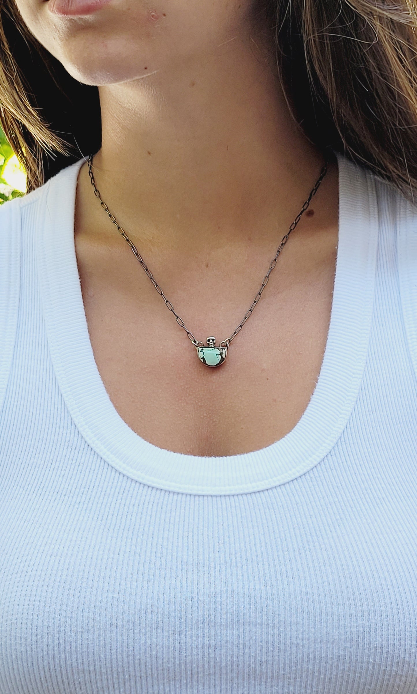 Handcrafted Sterling Silver pendant features a high-quality Turquoise stone