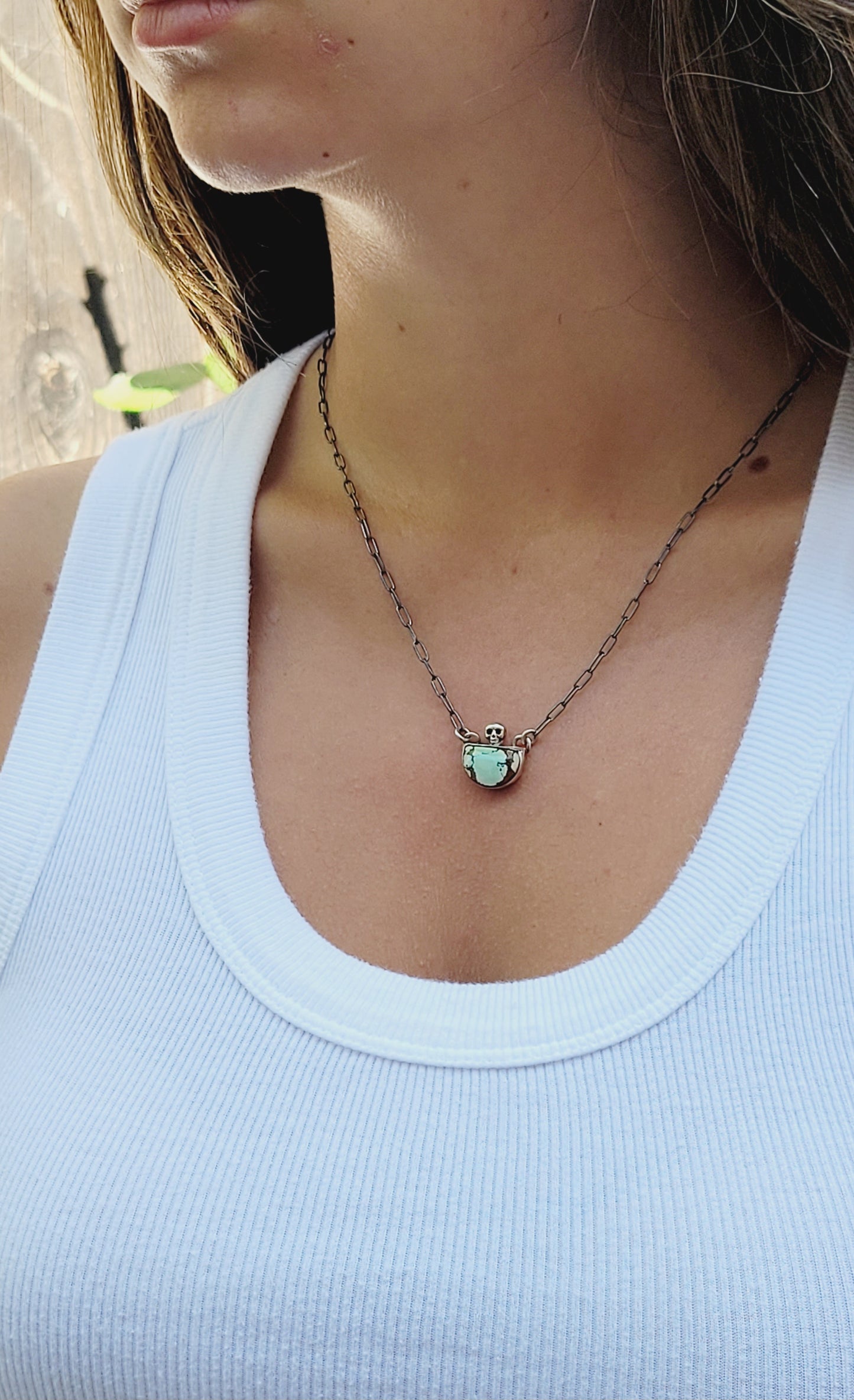 Handcrafted Sterling Silver pendant features a high-quality Turquoise stone