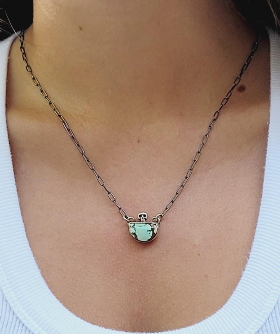 Handcrafted Sterling Silver pendant features a high-quality Turquoise stone