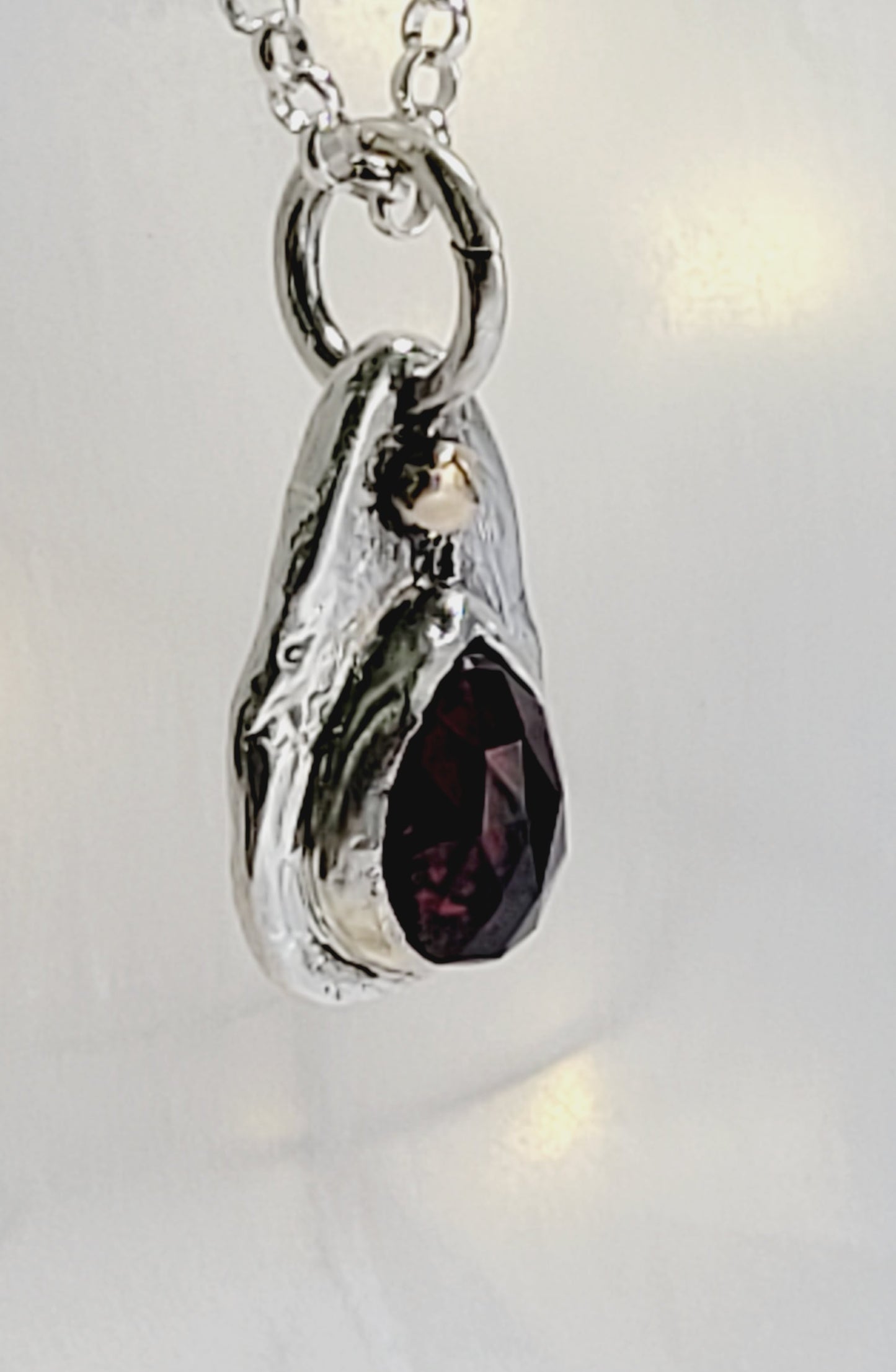 Sterling Silver pendant with Garnet and 14K Gold