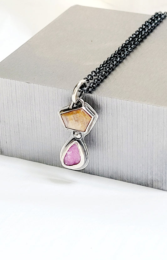 Handmade sterling silver pendant set with a citrine topaz and a cobalt mineral