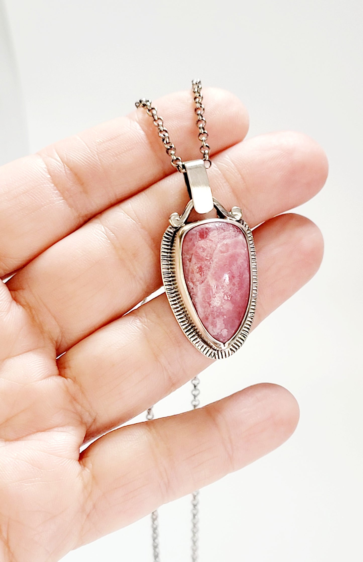 Handmade Pendant in Sterling Silver and Incarose with work on the back