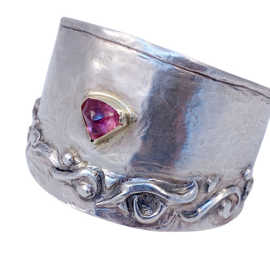 This hammered and chiseled sterling silver bracelet